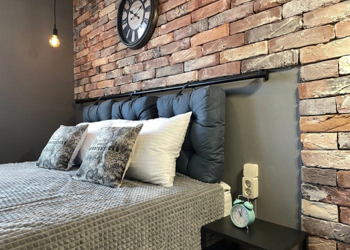 With Clock in Loft Style Apartment