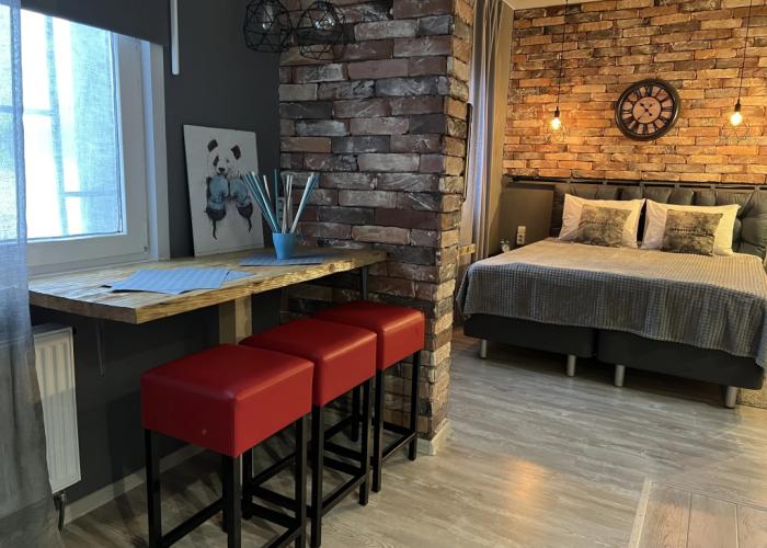 With Clock in Loft Style Apartment