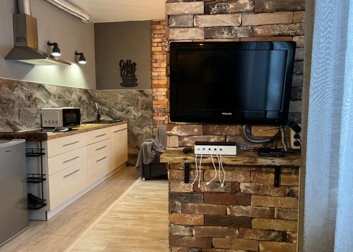 With Clock in Loft Style Apartment