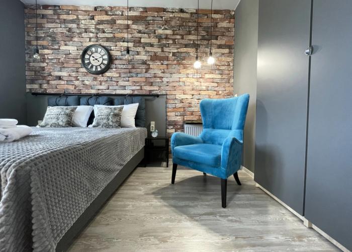 With Clock in Loft Style Apartment