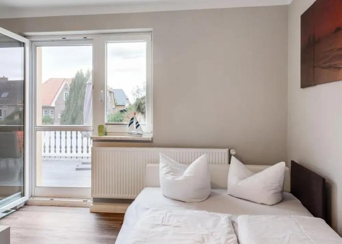 Snug Apartment in Kalkhorst with Terrace near City Center