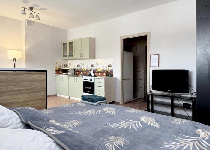 Na Romana Kuzovatkina 18 Flat