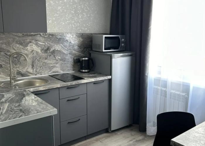 V Tsentre Goroda Flat
