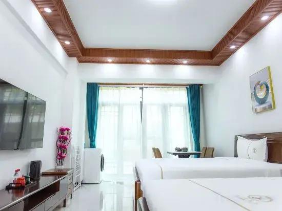 Jizhu Holiday Apartment (Menghai Mengbala Store)
