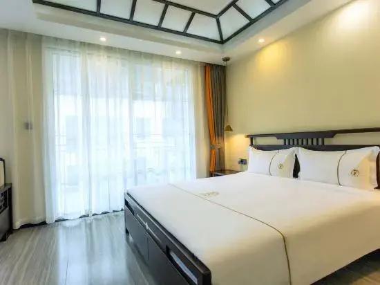 Jizhu Holiday Apartment (Menghai Mengbala Store)