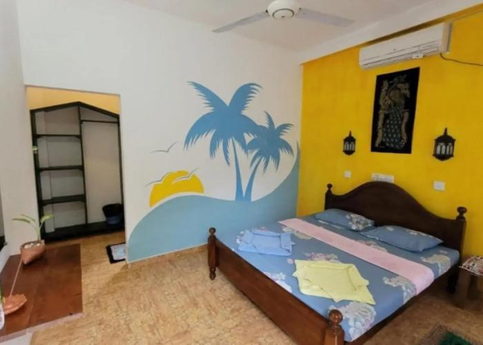 Malika's Yellow House