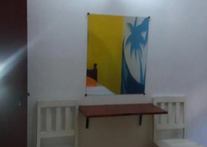 Malika's Yellow House