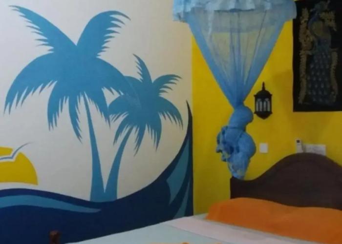 Malika's Yellow House