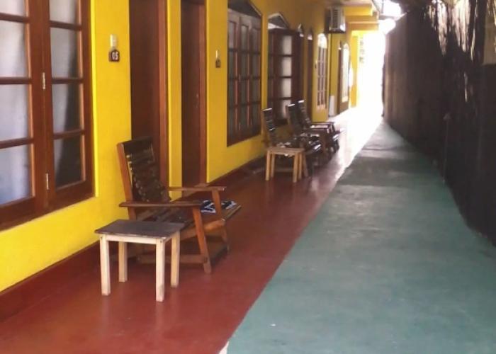 Malika's Yellow House