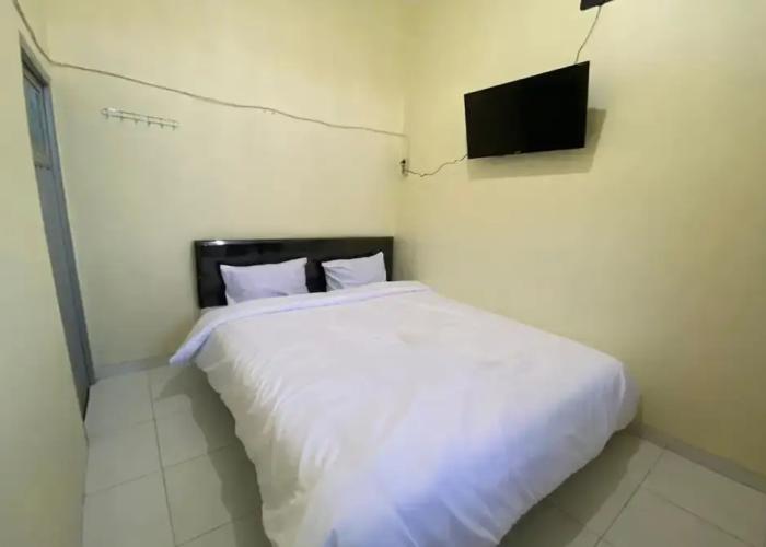 SPOT ON 93452 Wulan Homestay 2  Syariah