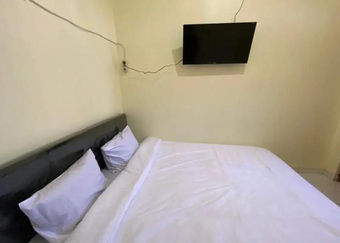 SPOT ON 93452 Wulan Homestay 2  Syariah