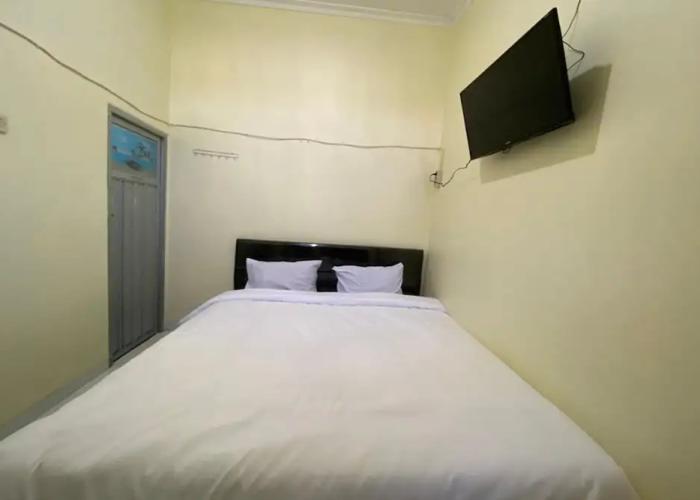 SPOT ON 93452 Wulan Homestay 2  Syariah