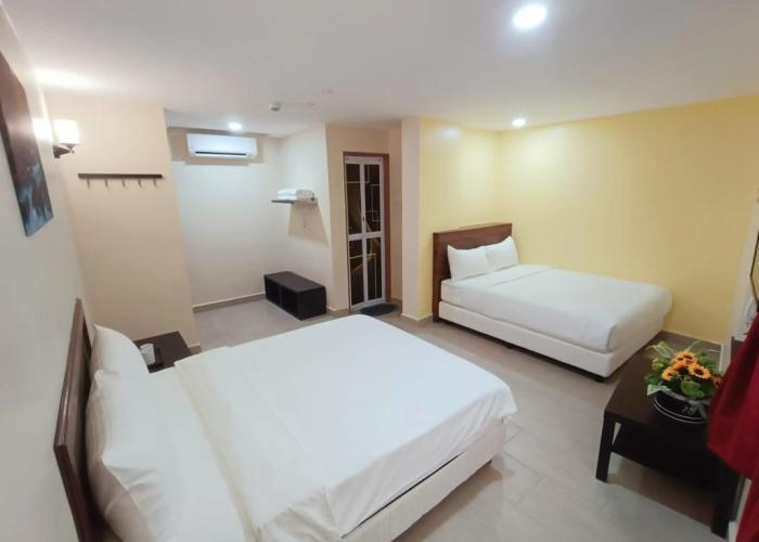 Capital O 90897 Island City Hotel