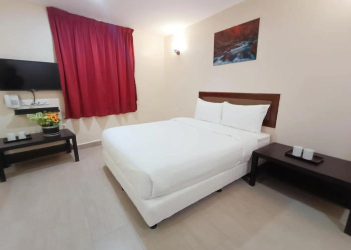 Capital O 90897 Island City Hotel