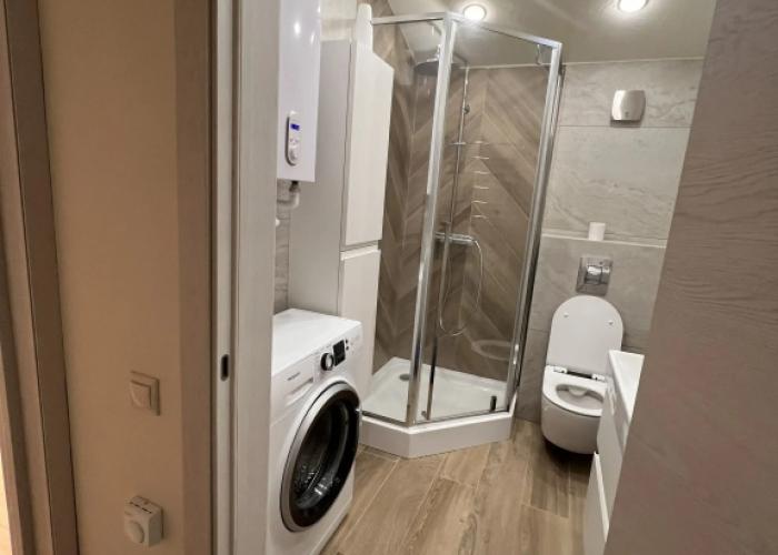 Uyutny dom u ozera Guest house