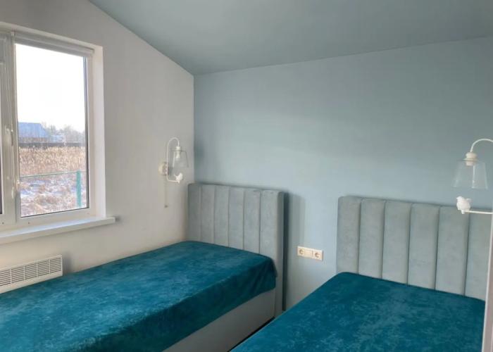 Uyutny dom u ozera Guest house