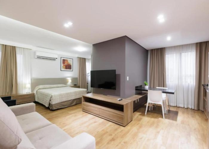 Le Village Flats e Hotel