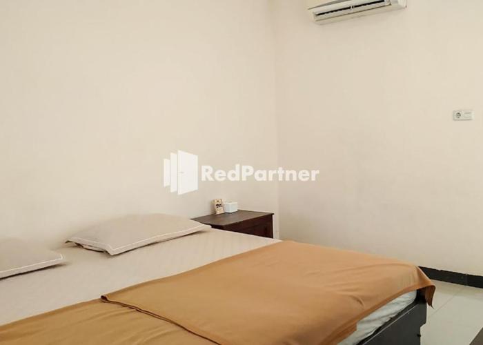 Palu City Guest House RedPartner