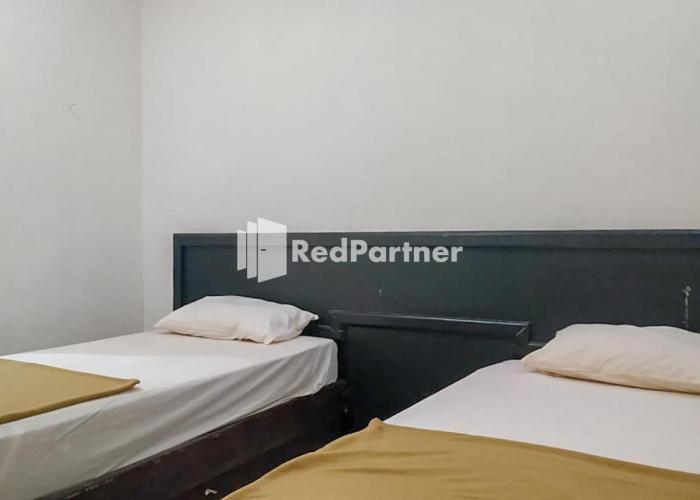 Palu City Guest House RedPartner