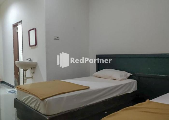 Palu City Guest House RedPartner