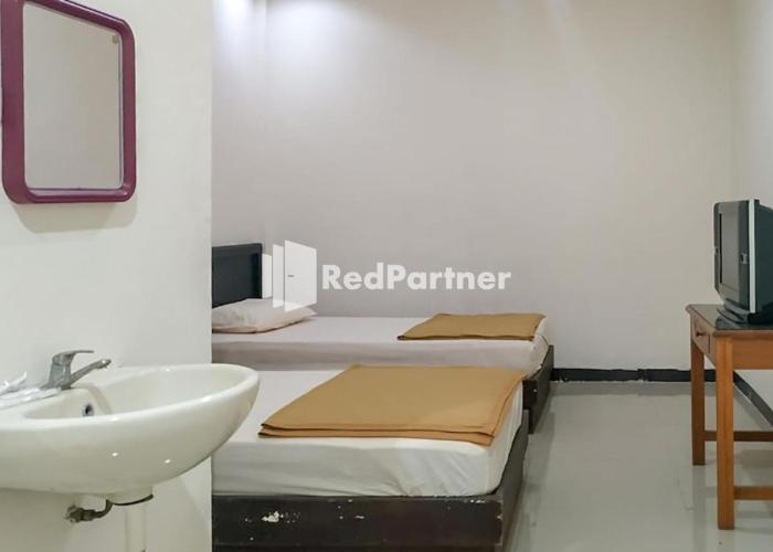 Palu City Guest House RedPartner