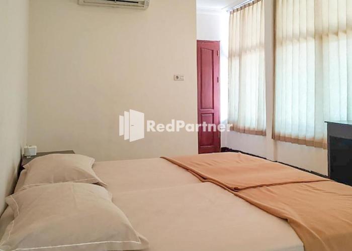 Palu City Guest House RedPartner