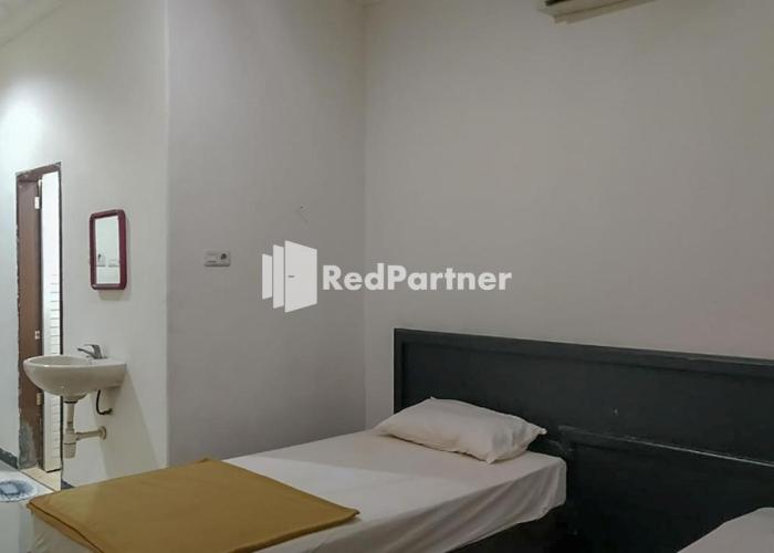 Palu City Guest House RedPartner
