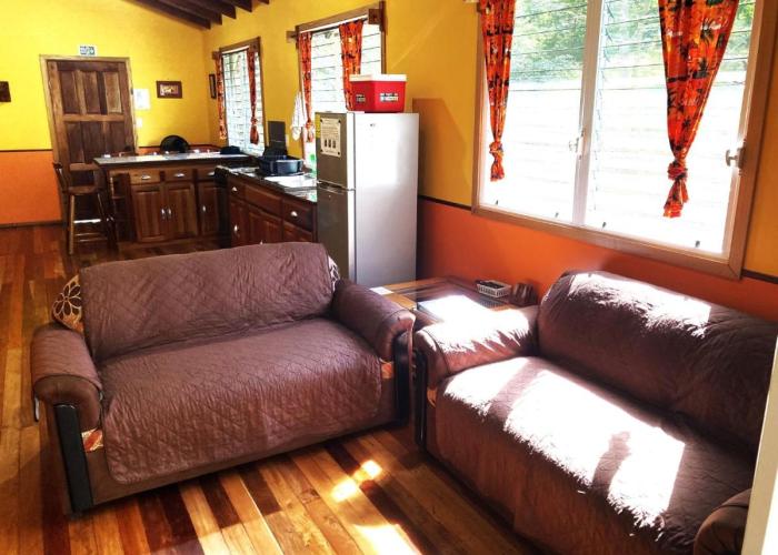 Fully equipped 2 bedroom tree top cottage, with large balcony in private garden