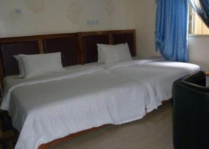 Room in Lodge - Definite Destiny Hotel