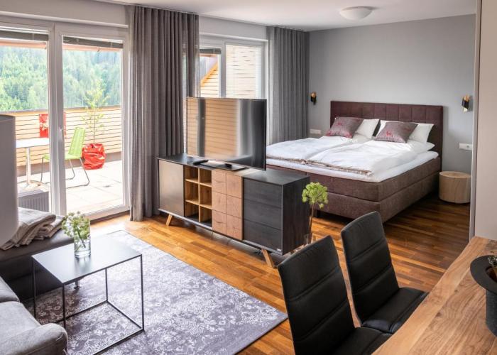 der Sonnberg Alpinlodges - Apartments mit Seeblick, privater Sauna und Self Check-In