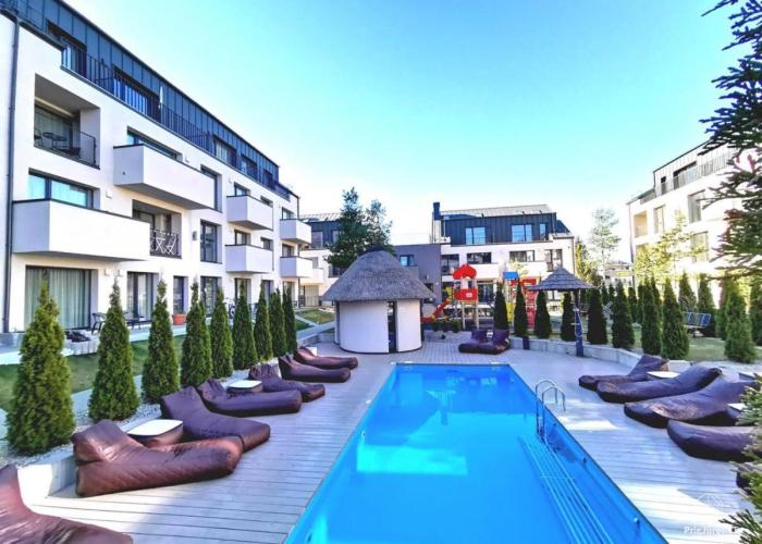 Apartamentai “VASARA” Malūno vilose