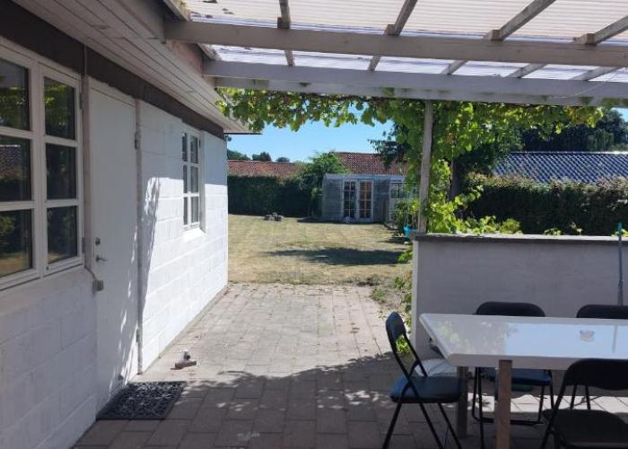 Stuelejlighed med have og overdækket terrasse