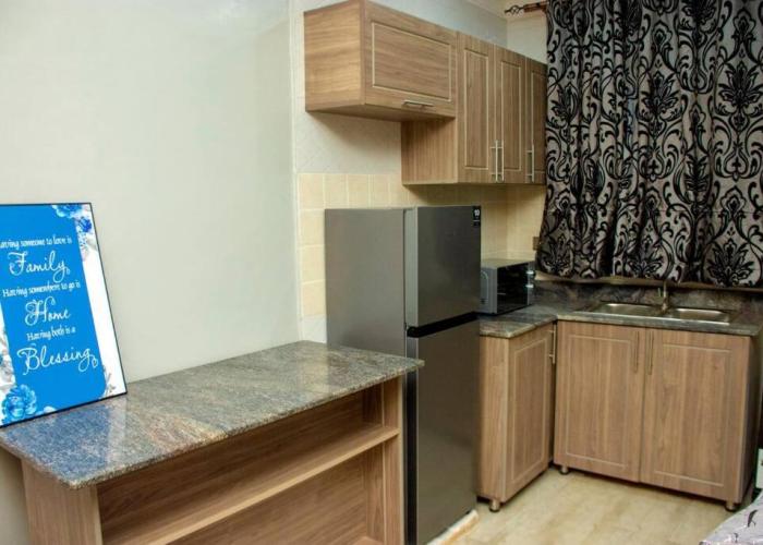 Secure cozy getaway near Kampala business district