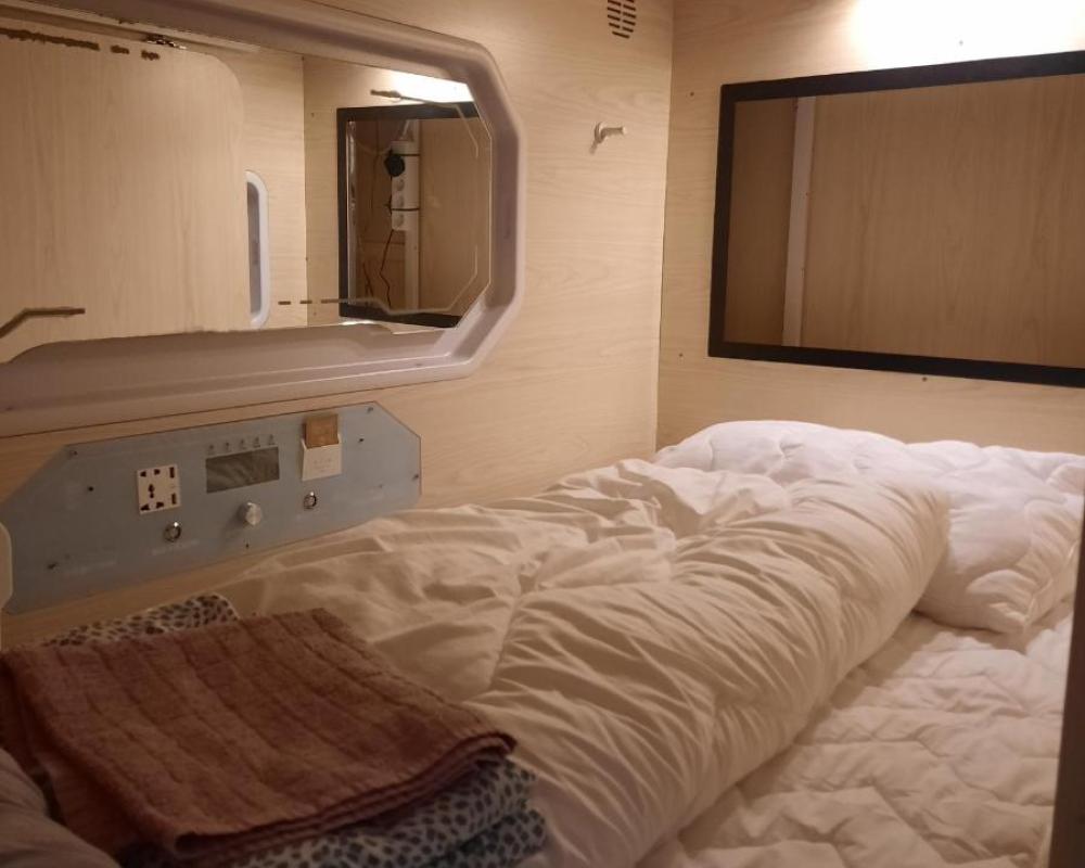 фото Sleeping capsule in a shared room