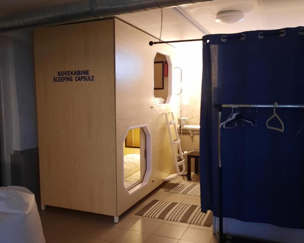 фото Sleeping capsule in a shared room