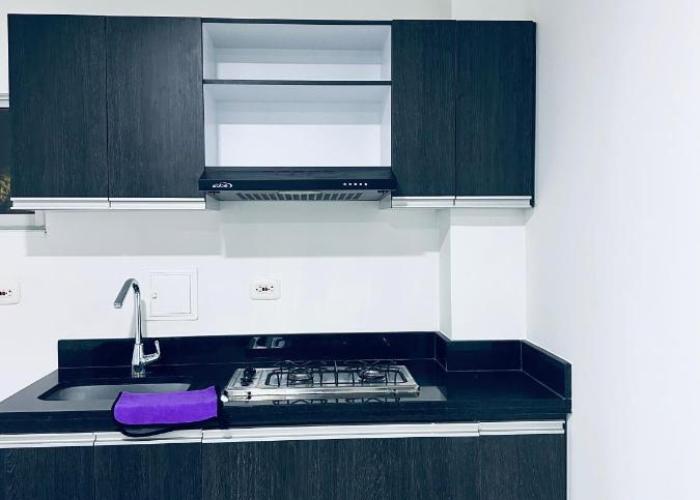 Hermoso aparta estudio con Aire Acondicionado en un primer piso