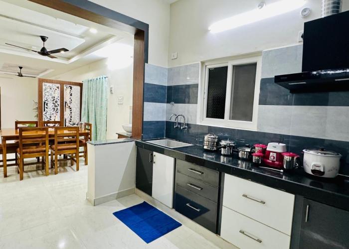 TrueLife Homestays - Sai Nivas - 3BHK AC Apartments for group of families - Best location - Flyover to Alipiri gate - Walk to PS4 Veg Restaurant - Modular Kitchen - Super fast WiFi - Android TV - 250 Jio Channels - Easy access to visit all Temples