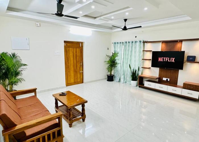 TrueLife Homestays - Sai Nivas - 3BHK AC Apartments for group of families - Best location - Flyover to Alipiri gate - Walk to PS4 Veg Restaurant - Modular Kitchen - Super fast WiFi - Android TV - 250 Jio Channels - Easy access to visit all Temples