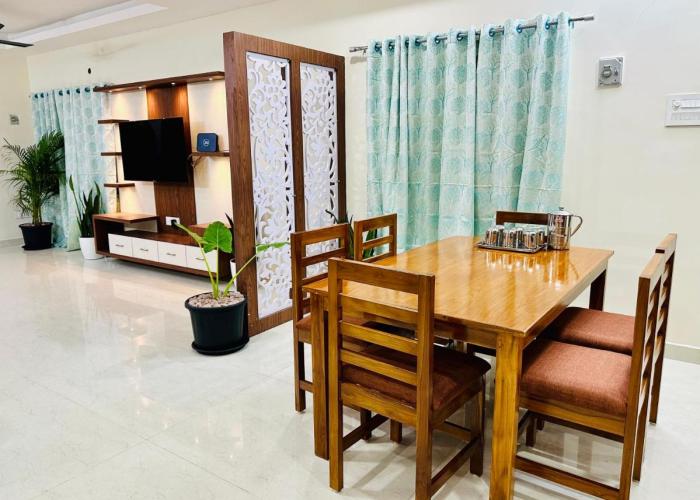 TrueLife Homestays - Sai Nivas - 3BHK AC Apartments for group of families - Best location - Flyover to Alipiri gate - Walk to PS4 Veg Restaurant - Modular Kitchen - Super fast WiFi - Android TV - 250 Jio Channels - Easy access to visit all Temples