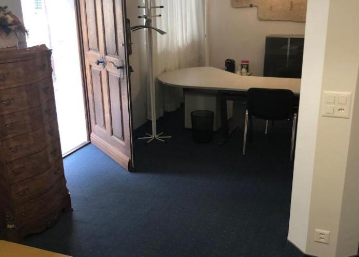 Bedroom cum office with shared shower in Zug's Old Town