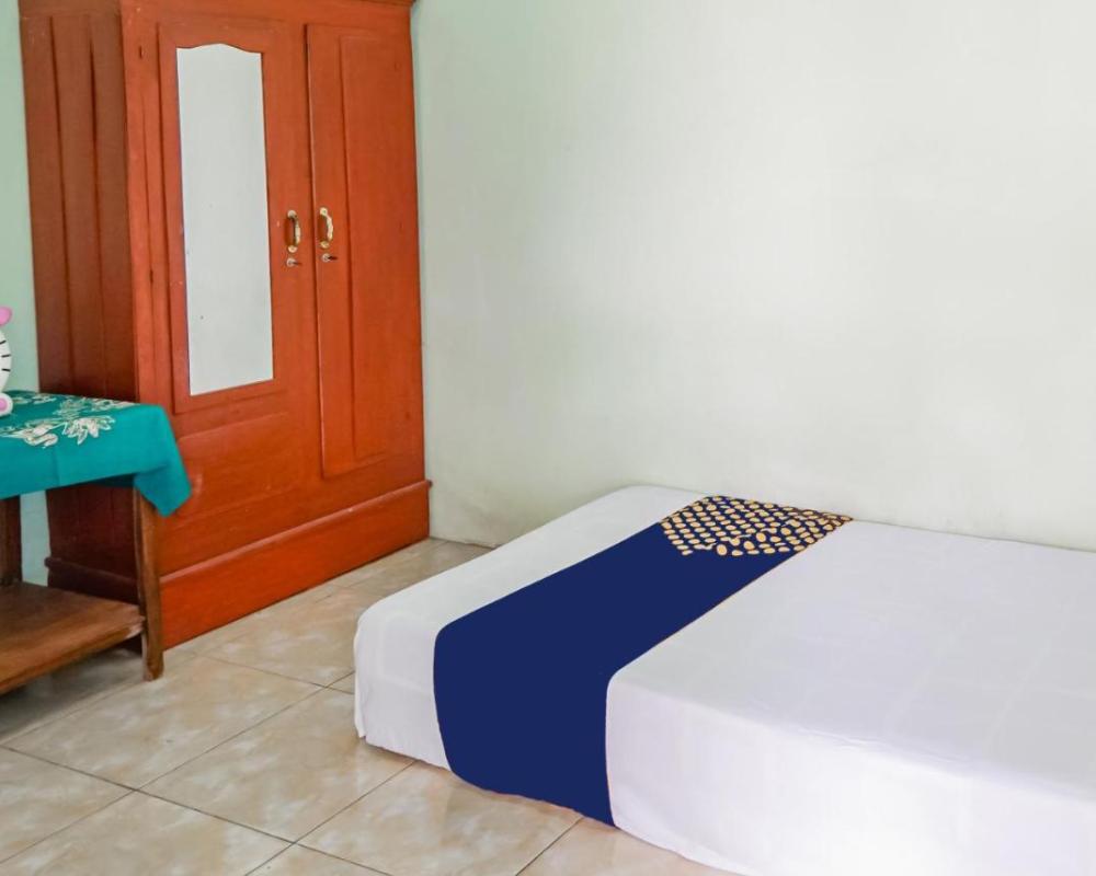 SPOT ON 93879 Wunut Homestay Syariah