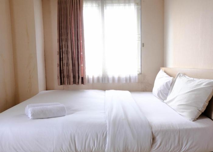 Simply Homey 2BR at 11st Floor Pinewood Apartment By Travelio