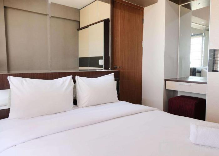 Spacious 3BR Combined Unit at Pinewood Apartment By Travelio