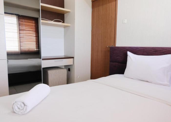 Spacious 3BR Combined Unit at Pinewood Apartment By Travelio