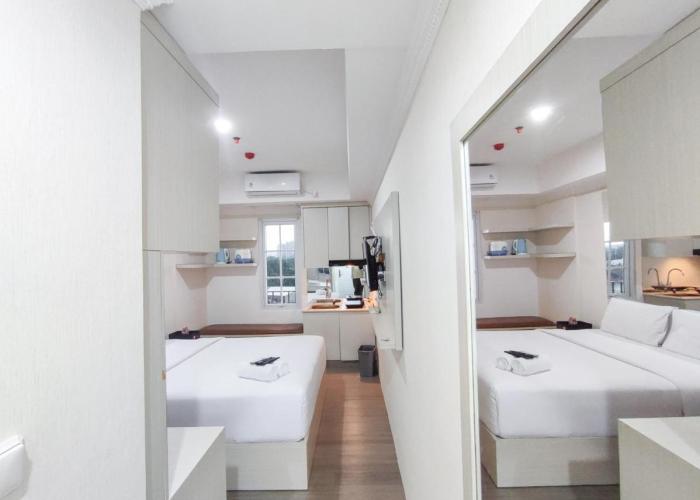 Warm and Cozy Style Studio Room at Paltrow City Apartment By Travelio