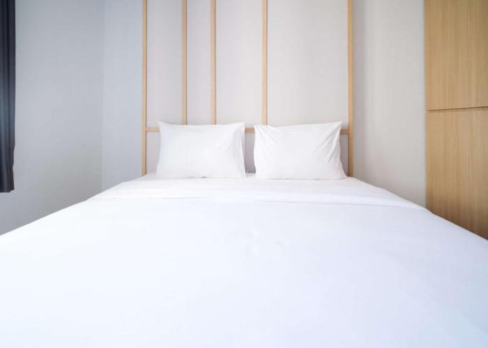 Comfy and Spacey 2BR Apartment at Suncity Residence By Travelio
