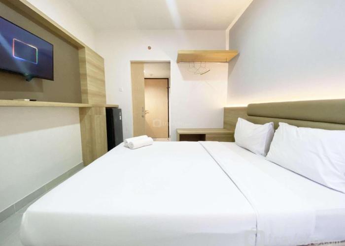 Homey and Modern Studio The Alton Apartment By Travelio