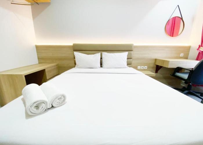 Homey and Modern Studio The Alton Apartment By Travelio