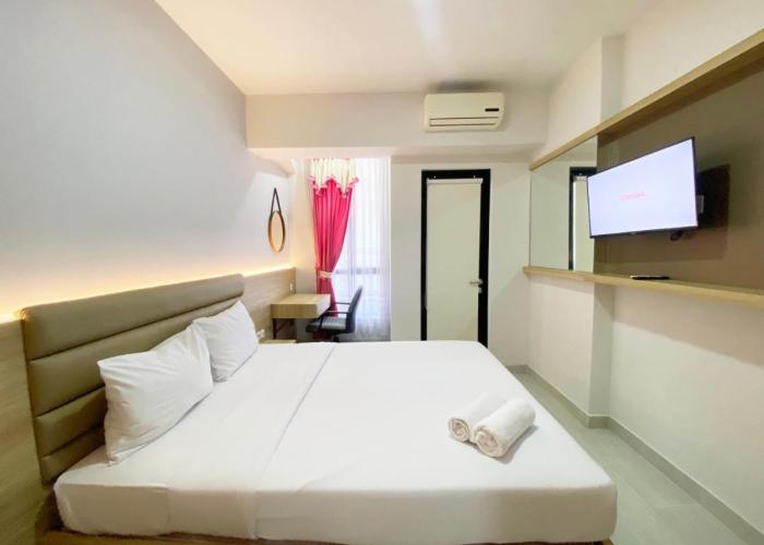 Homey and Modern Studio The Alton Apartment By Travelio