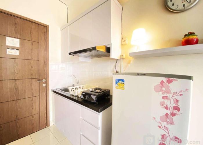 Homey Studio Room at Harvard Jatinangor Apartment By Travelio
